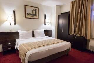 Отель Ramada Iasi City Center Яссы Номер с кроватью размера «queen-size»-1